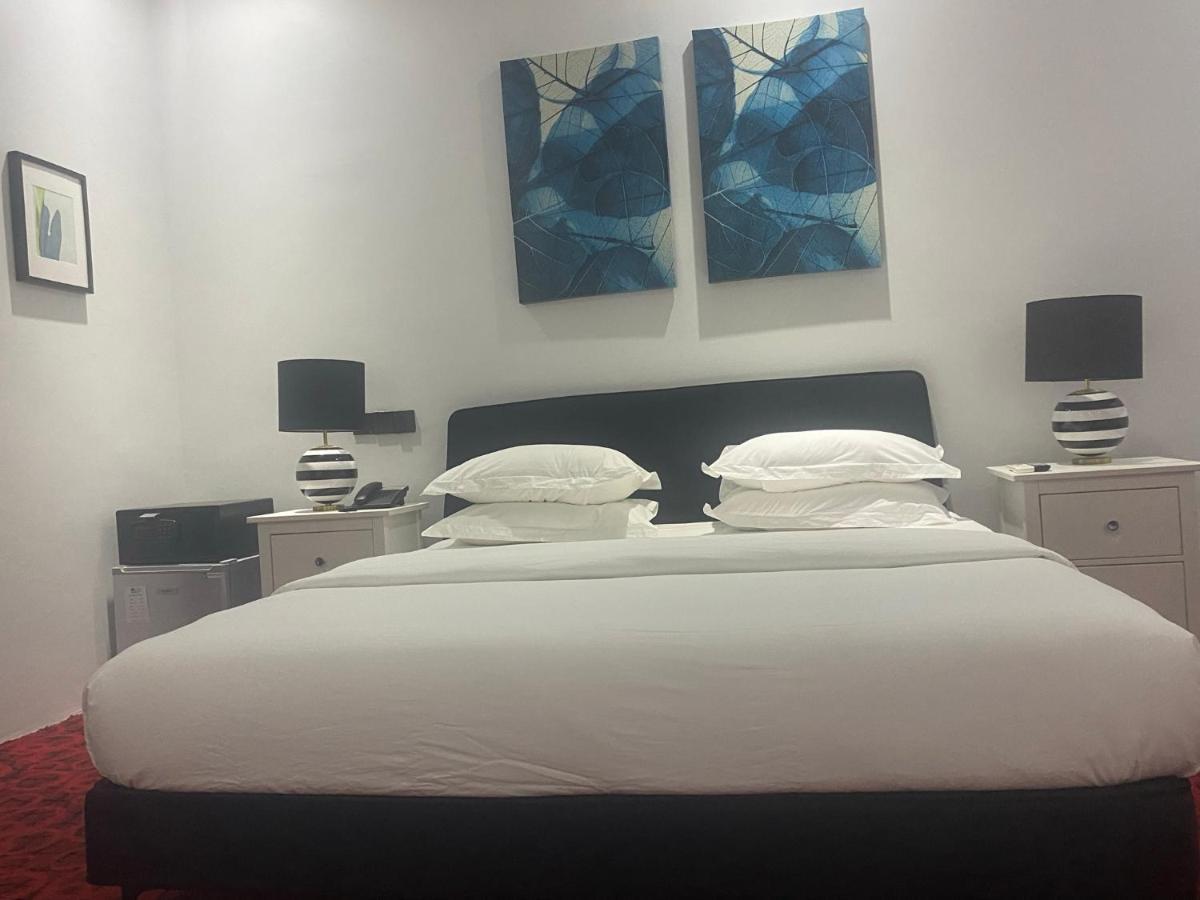 Muse Boutique Hotel Энугу Экстерьер фото